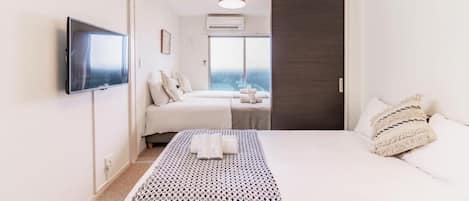 Family Room, Non Smoking, City View | Blackout drapes, soundproofing, free WiFi