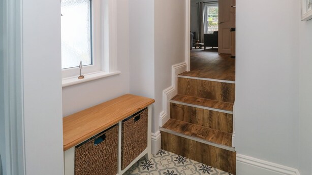 A staircase with wooden steps and a white wall. - The English School, Flat 2 (Dartmouth)