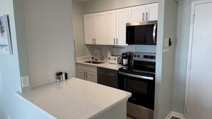 Fridge, microwave, oven, stovetop - Oceanfront Condo On Boardwalk Virginia beach (Virginia Beach)
