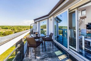 Outdoor dining - Holiday flat with air conditioning and sea view (Funtana)