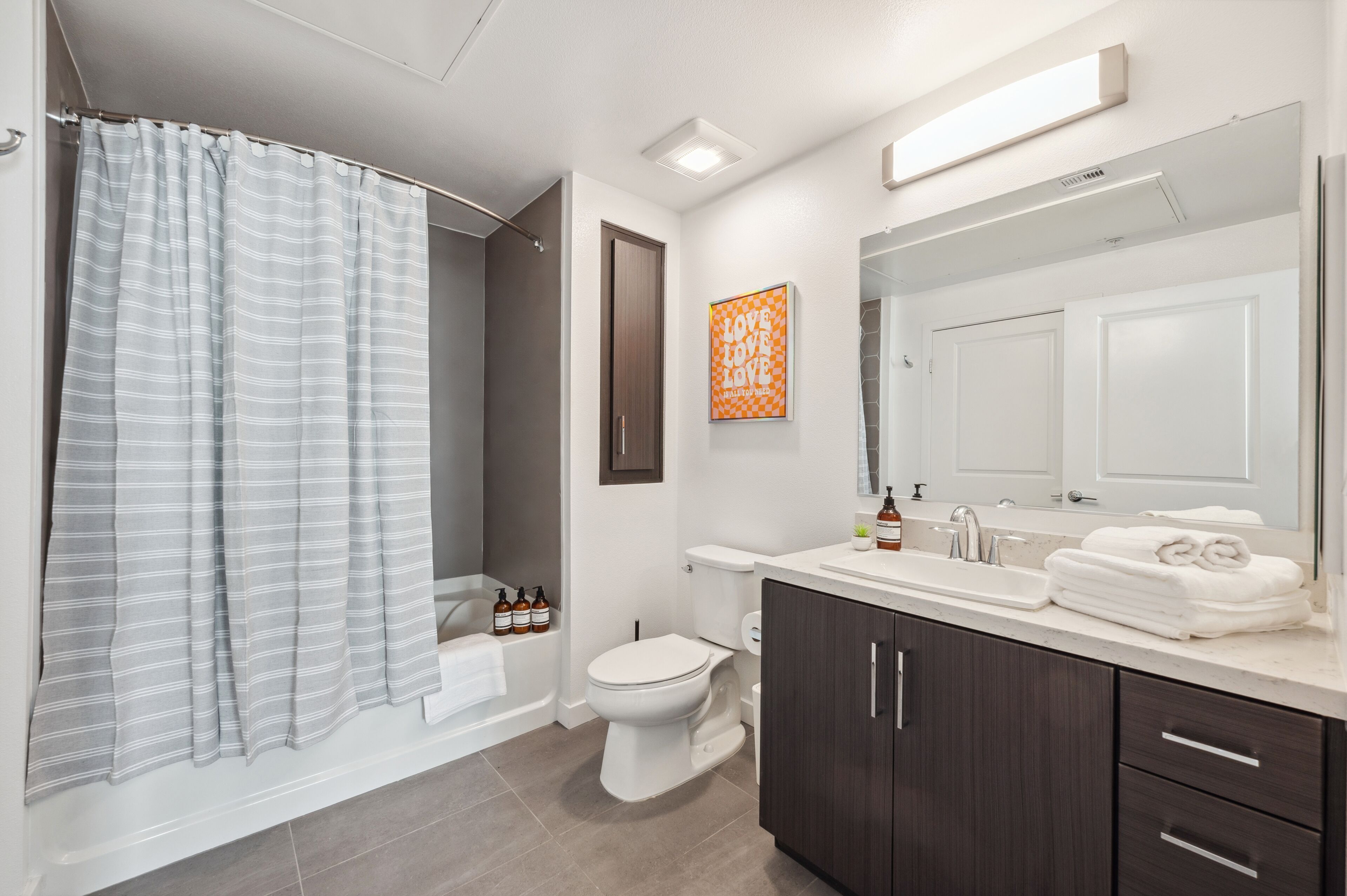 Hair dryer, towels, soap, shampoo