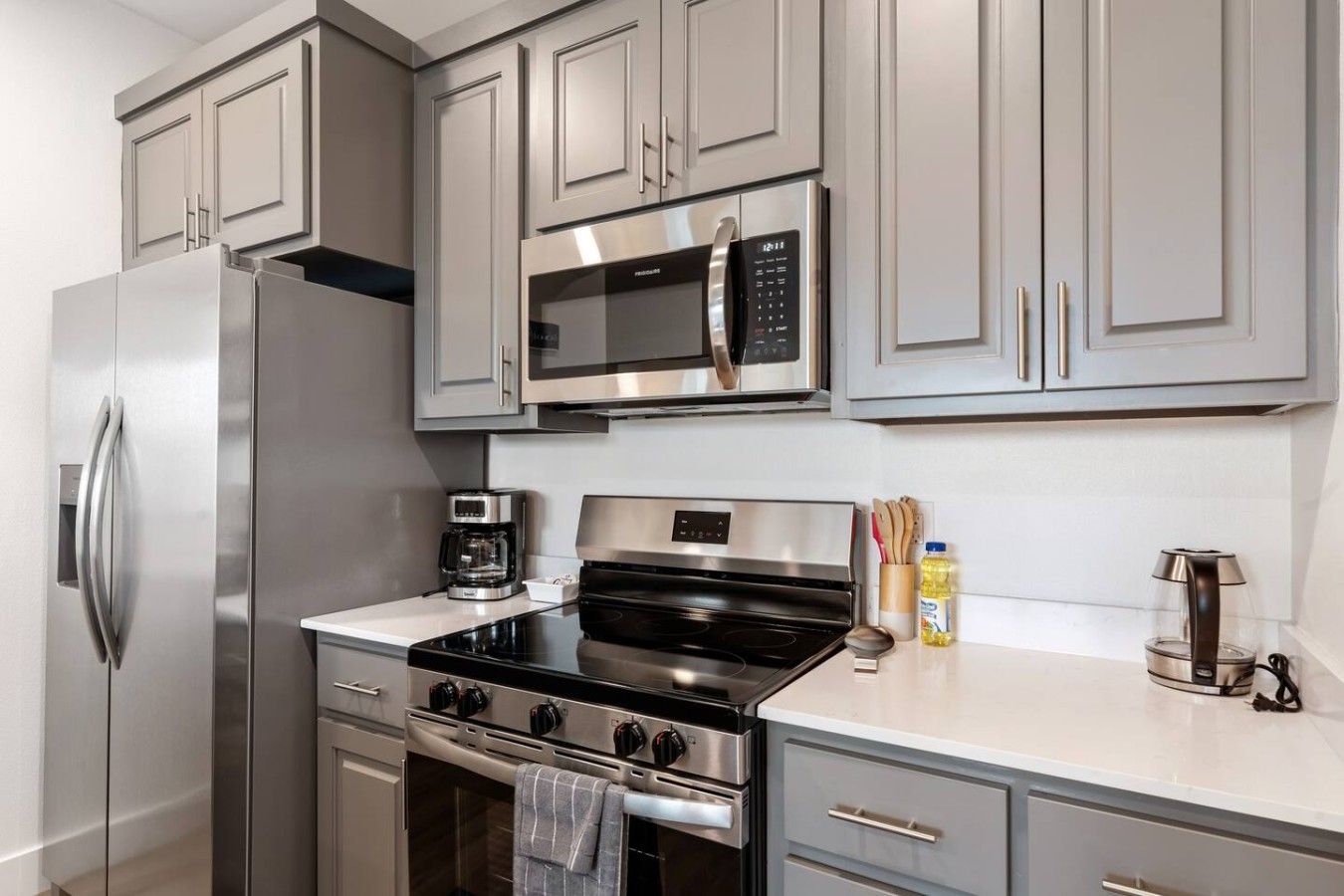Coffee/tea maker, fridge, microwave, oven