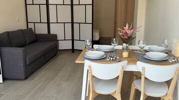 Familieleilighet, byutsikt | Spiseområde