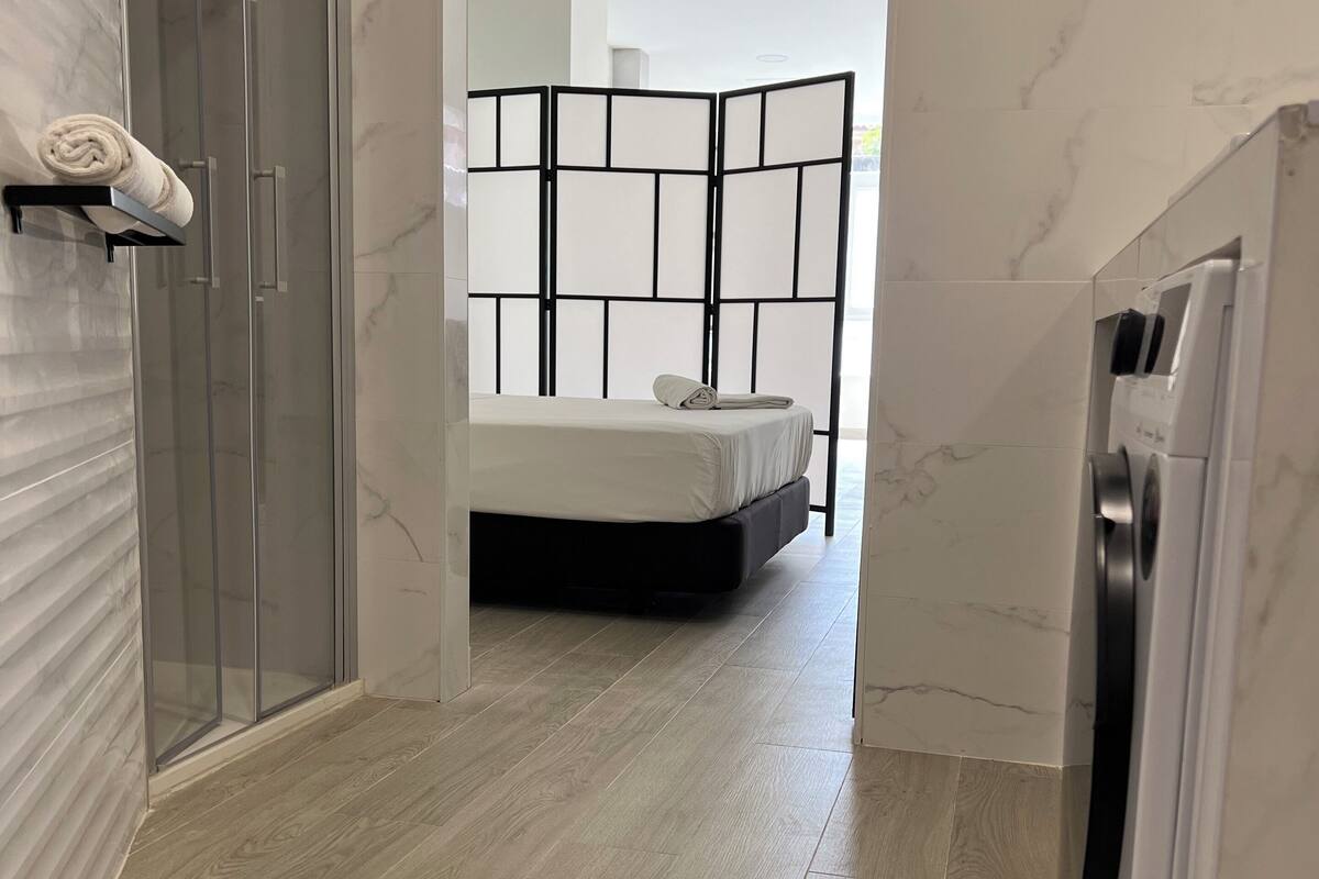 Apartamento estándar, vistas a la ciudad | Cortinas opacas, tabla de planchar con plancha, wifi gratis