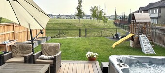 Executive Spacious 5 BDRM Furnished Home w/Hot Tub, Fire Pit & A/C