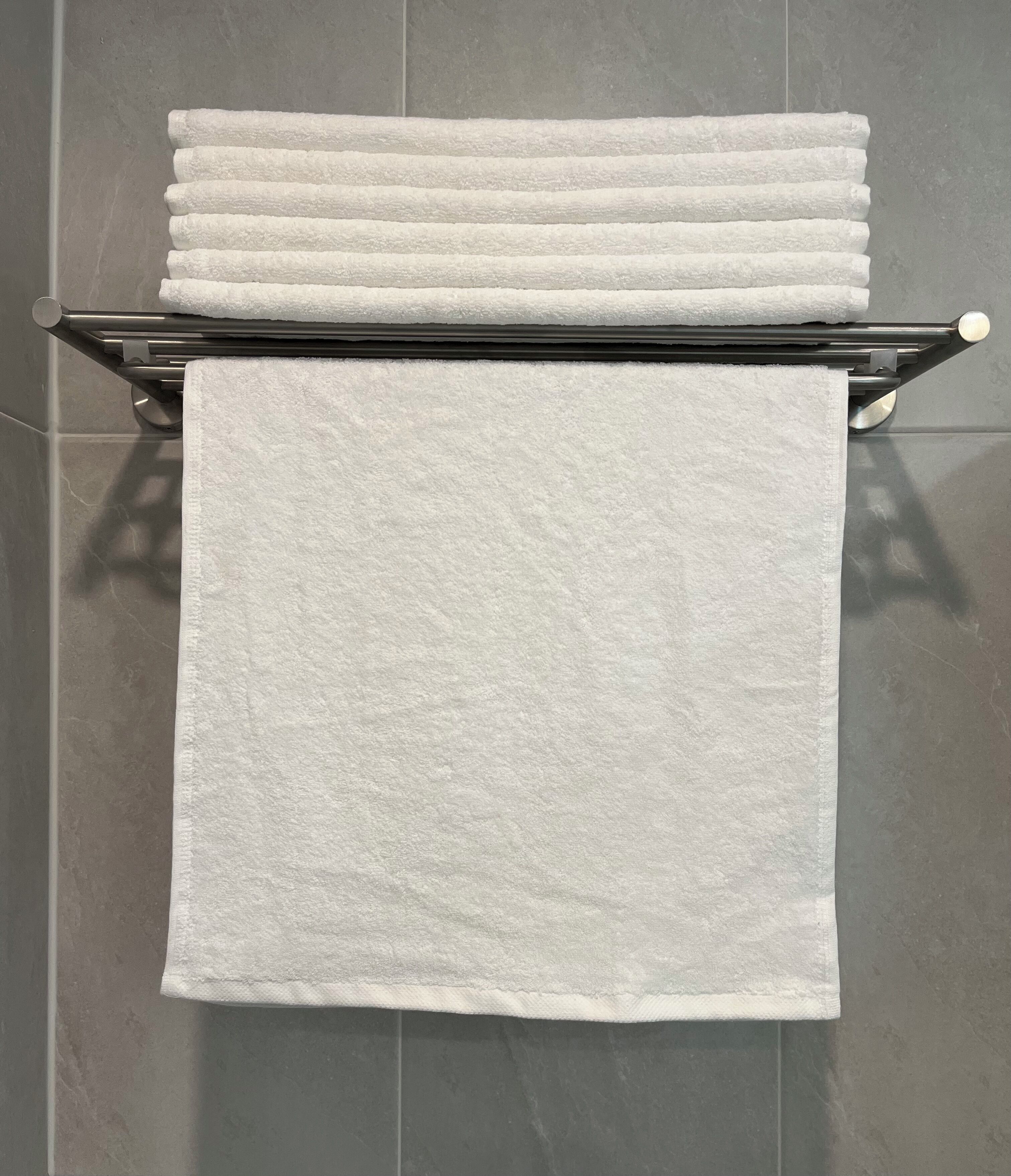 Shower, hair dryer, towels, shampoo