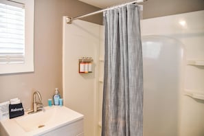 Hair dryer, towels, shampoo