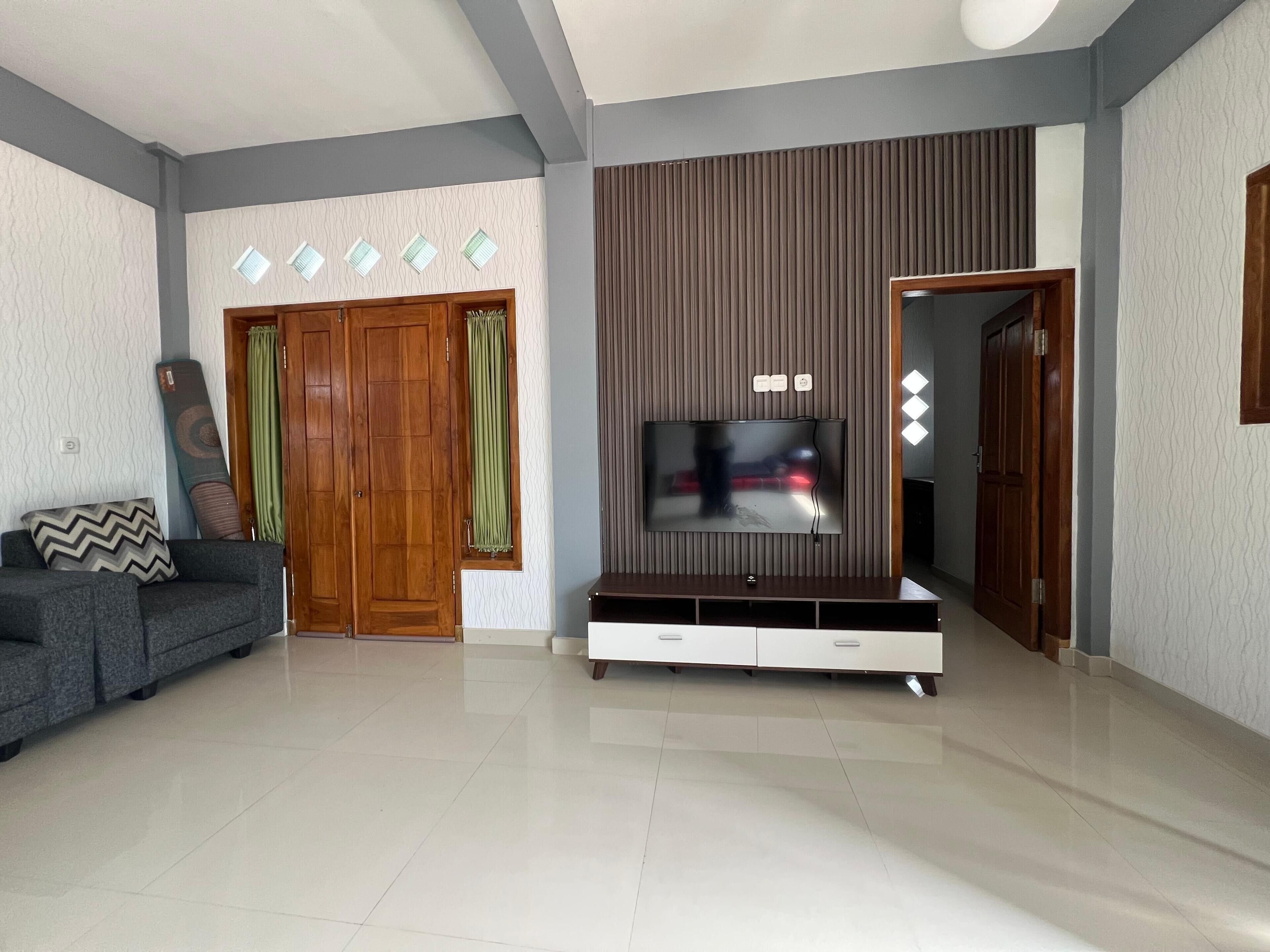 Habitación familiar | Área de sala de estar