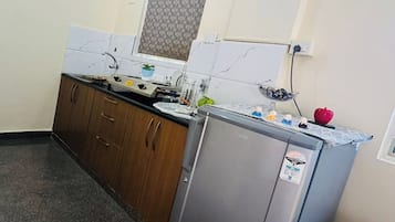 Quarto quádruplo | Área de estar | TV de tela plana 32 polegadas com canais a cabo