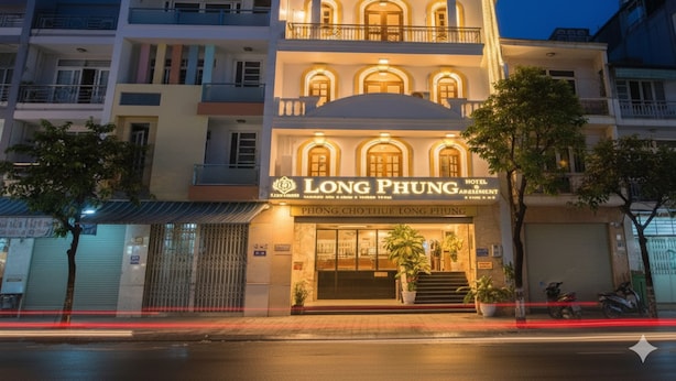 A multi-story building with a prominent sign for Long Phung Hotel. - Collection O Long Phung Hotel (Ho Chi Minh City)