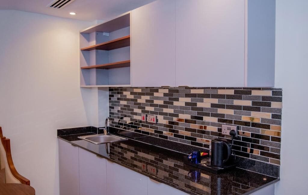 Executive Suite, Balcony, Mountain View | Private kitchen | Fridge, high chair