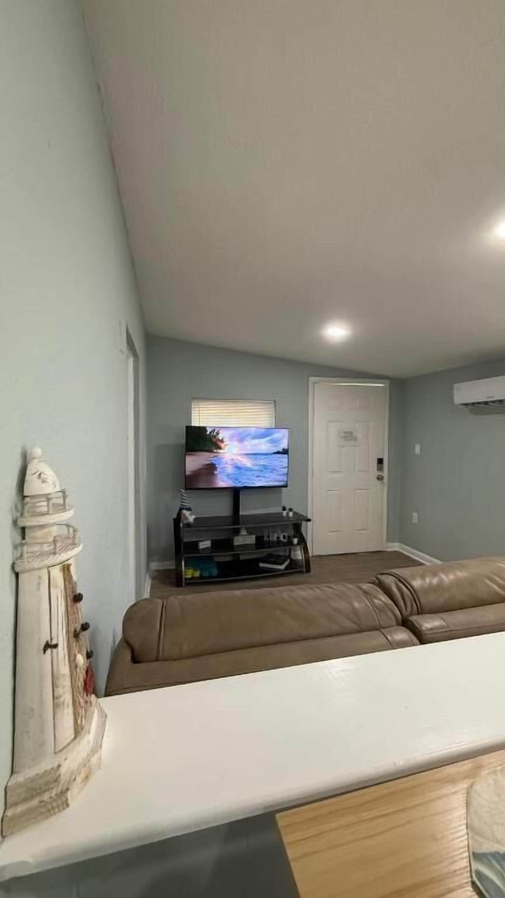 Suite Confort, 1 lit double, patio, vue jardin | Coin séjour