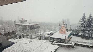 Family Room, City View | Property grounds