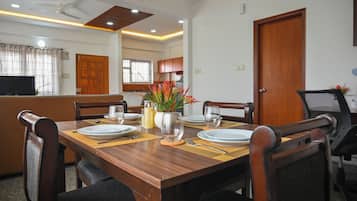 Two Bedroom Apartment | Living area | 32-inch flat-screen TV with cable channels