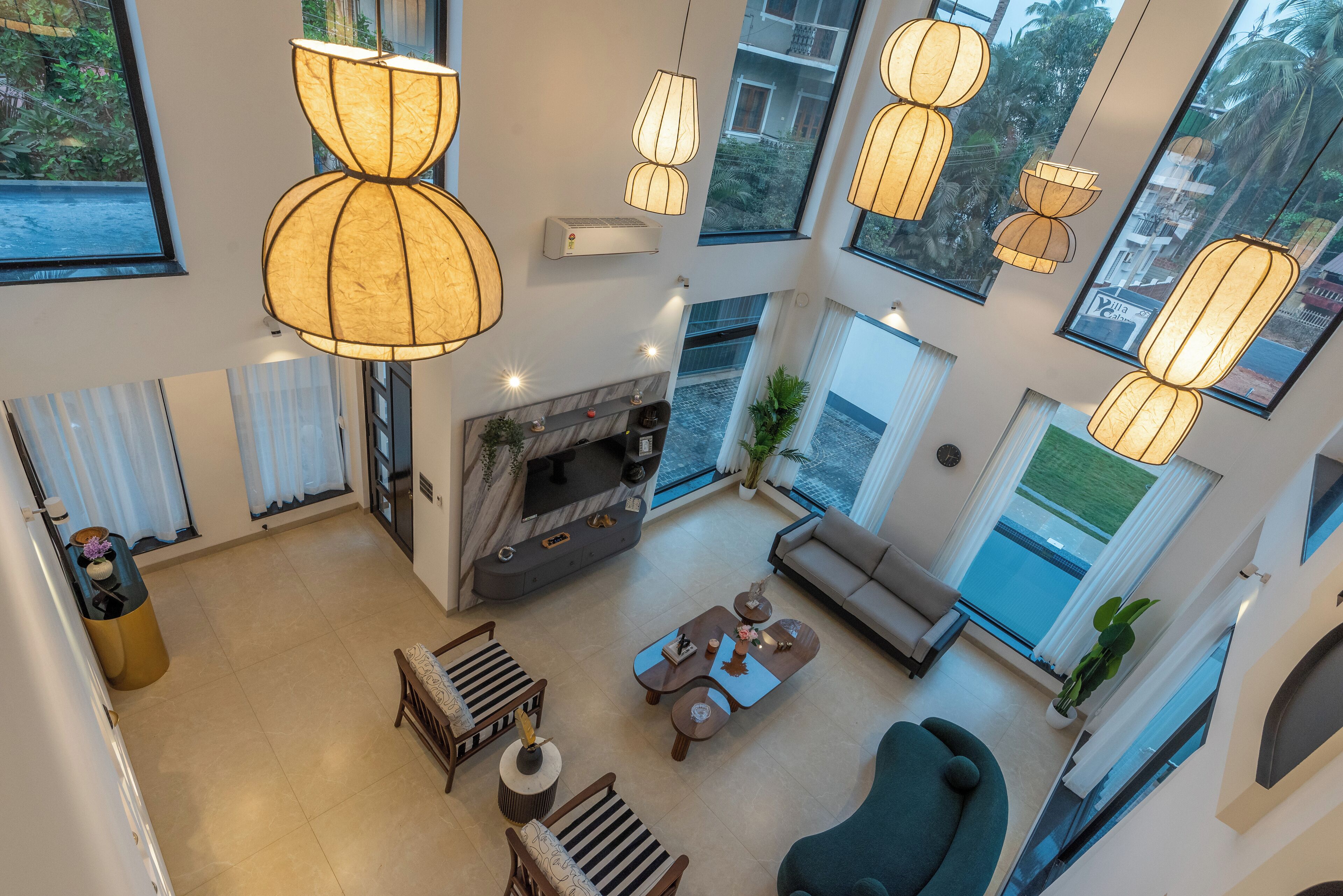 Deluxe Villa, Balcony, Garden View | Living area | 55-inch flat-screen TV with satellite channels