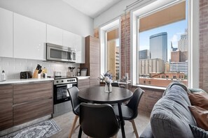 Fridge, microwave, oven, stovetop - Modern Downtown Apartment | Pool, Laundry, Valet Parking (Dallas)