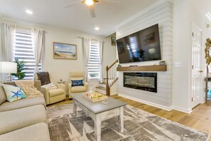 TV, fireplace, books