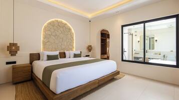 Premium bedding, memory-foam beds, minibar, in-room safe