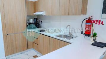 Apartamento, sacada | Cozinha privada