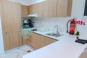 Apartamento, sacada | Cozinha privada