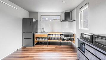 Fridge, microwave, stovetop, cookware/dishes/utensils