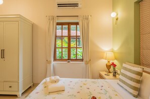 Standaard villa, balkon, uitzicht op tuin | Een kluis op de kamer, een strijkplank/strijkijzer, gratis wifi