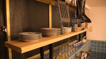 Fridge, microwave, stovetop, cookware/dishes/utensils