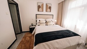 2 bedrooms, iron/ironing board, WiFi, bed sheets - Chic, Secure Kilimani Apartment | Near Yaya Centre, Junction Mall & CBD (Nairobi)