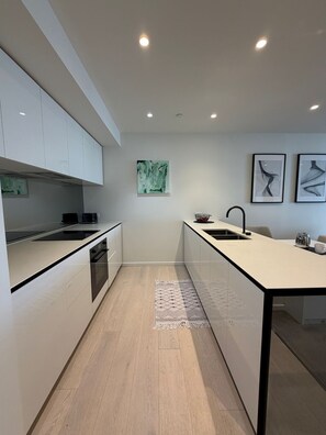 Apartamento, vistas a la ciudad | Cocina privada