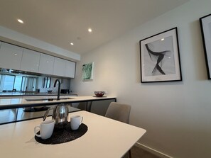 Apartamento, vistas a la ciudad | Cocina privada