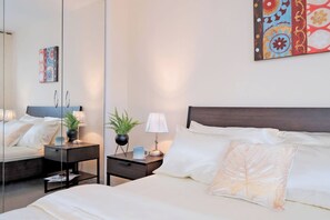 Ferros/tábuas de passar roupa, acesso à internet, roupa de cama