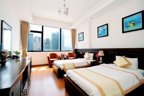 Kamar Triple Deluks, pemandangan laut | Isi minibar gratis, Wi-Fi gratis, dan seprai linen