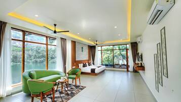 Luxury Suite, 1 King Bed, Balcony, Lake View | In-room safe, desk, laptop workspace, blackout curtains