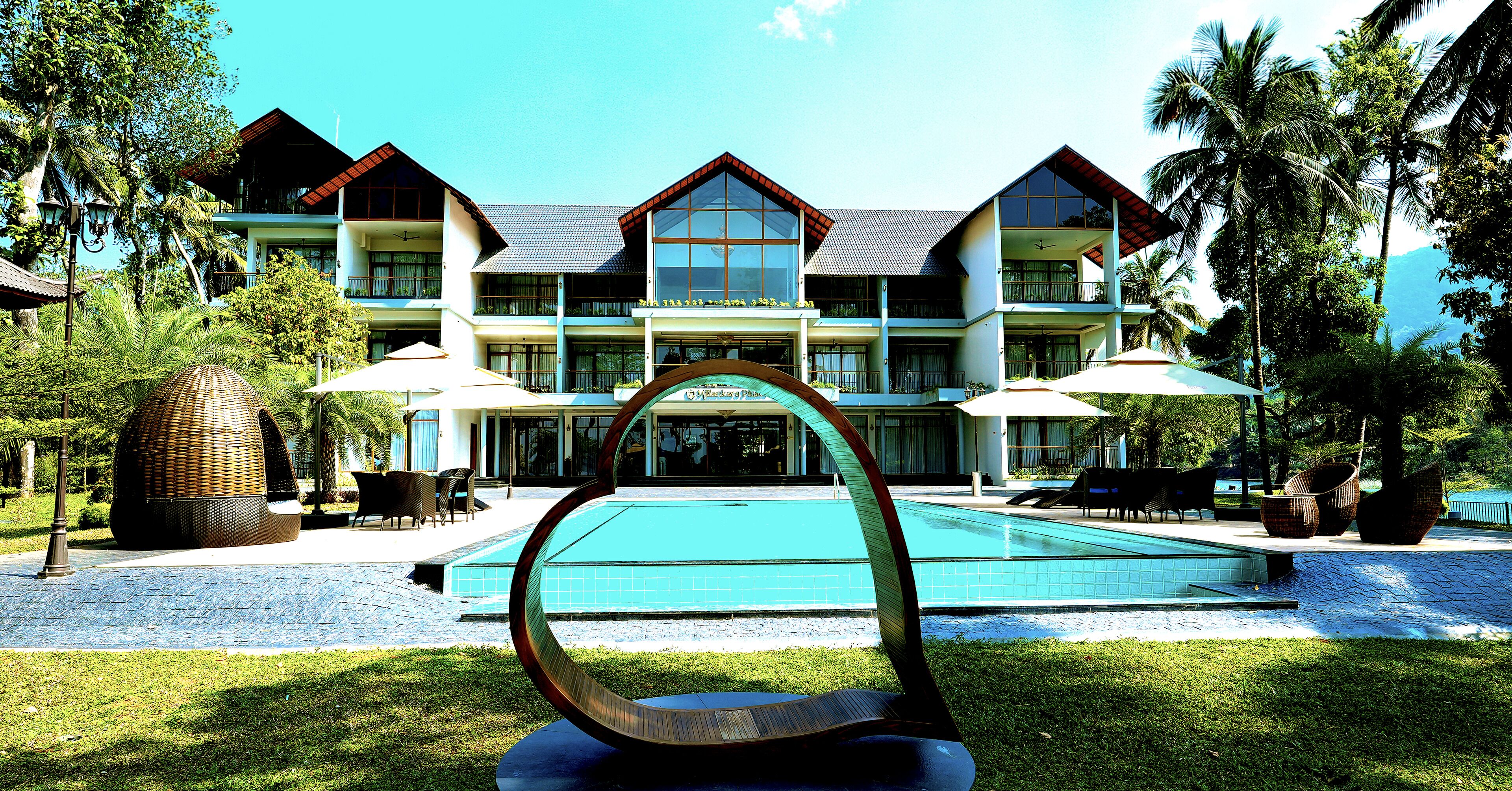 Outdoor pool, open 8:00 AM to 8:00 PM, pool umbrellas, pool loungers