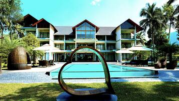 Outdoor pool, open 8:00 AM to 8:00 PM, pool umbrellas, pool loungers