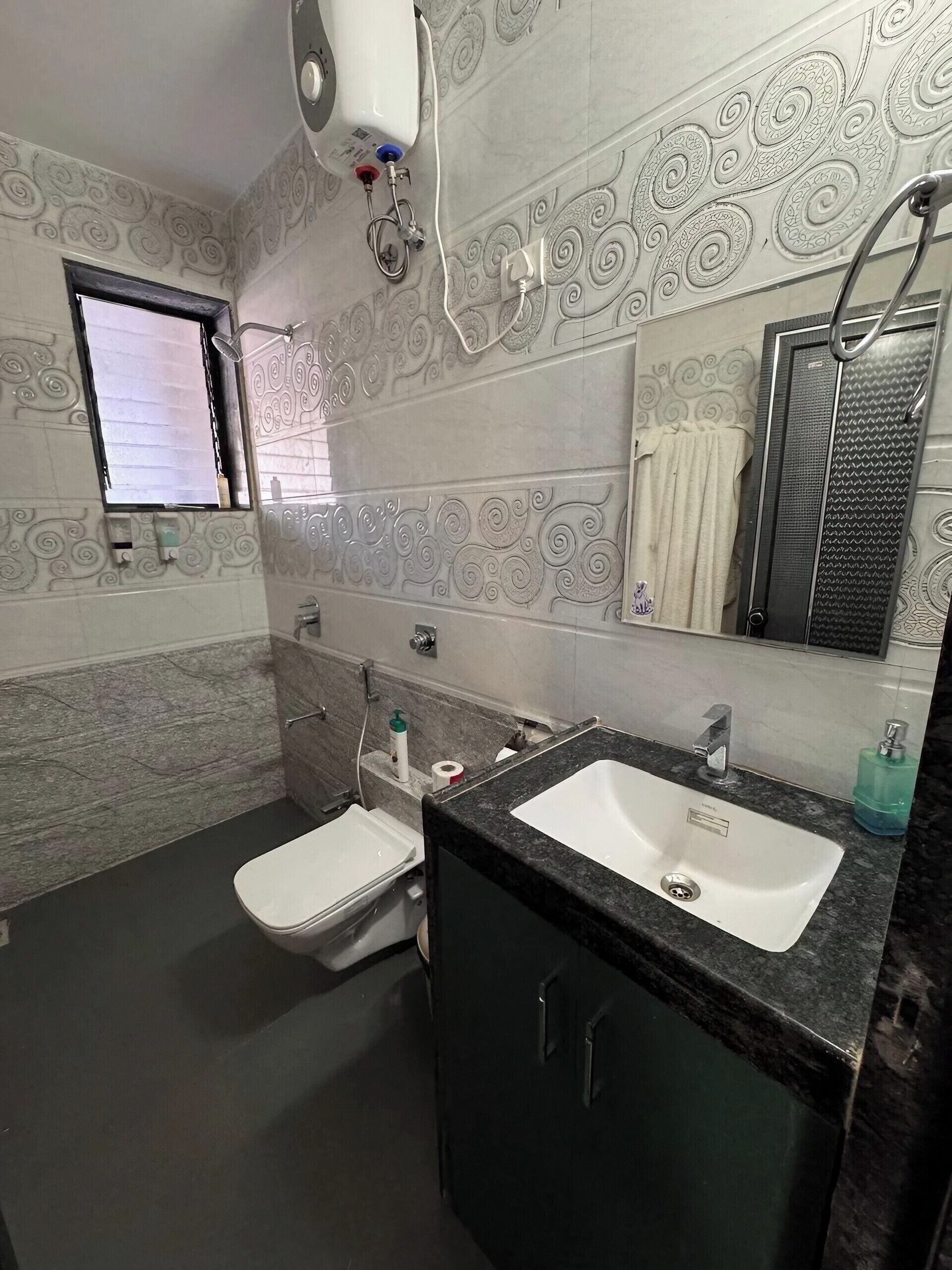 Hair dryer, towels, soap, shampoo