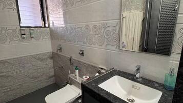 Hair dryer, towels, soap, shampoo