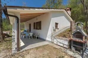 Outdoor dining - Holiday home in untouched nature (Dolenja Vas)
