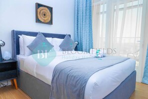 Apartment, Balcony | Iron/ironing board, free WiFi - -Bloomfields Modern 1BR in Oasis Masd (Abu Dhabi)