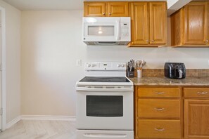 Superior Duplex, Park View | Private kitchen | Microwave, oven, cookware/dishes/utensils - Joy Drive In RV Resort  (Copperas Cove)