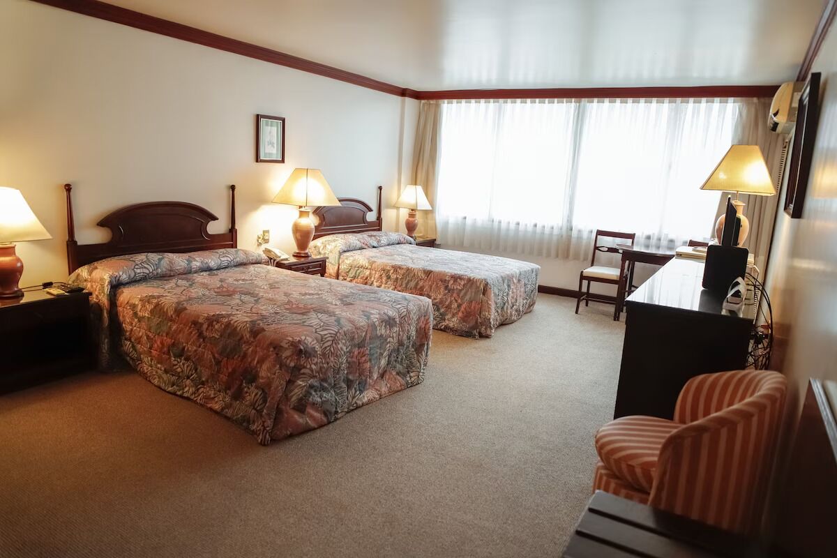Settle into two comfy beds with generous open floor space.