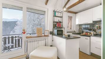 Honeymoon Apartment, Multiple Bedrooms (La Chicchetta) | Private kitchen | Fridge, microwave, stovetop, coffee/tea maker