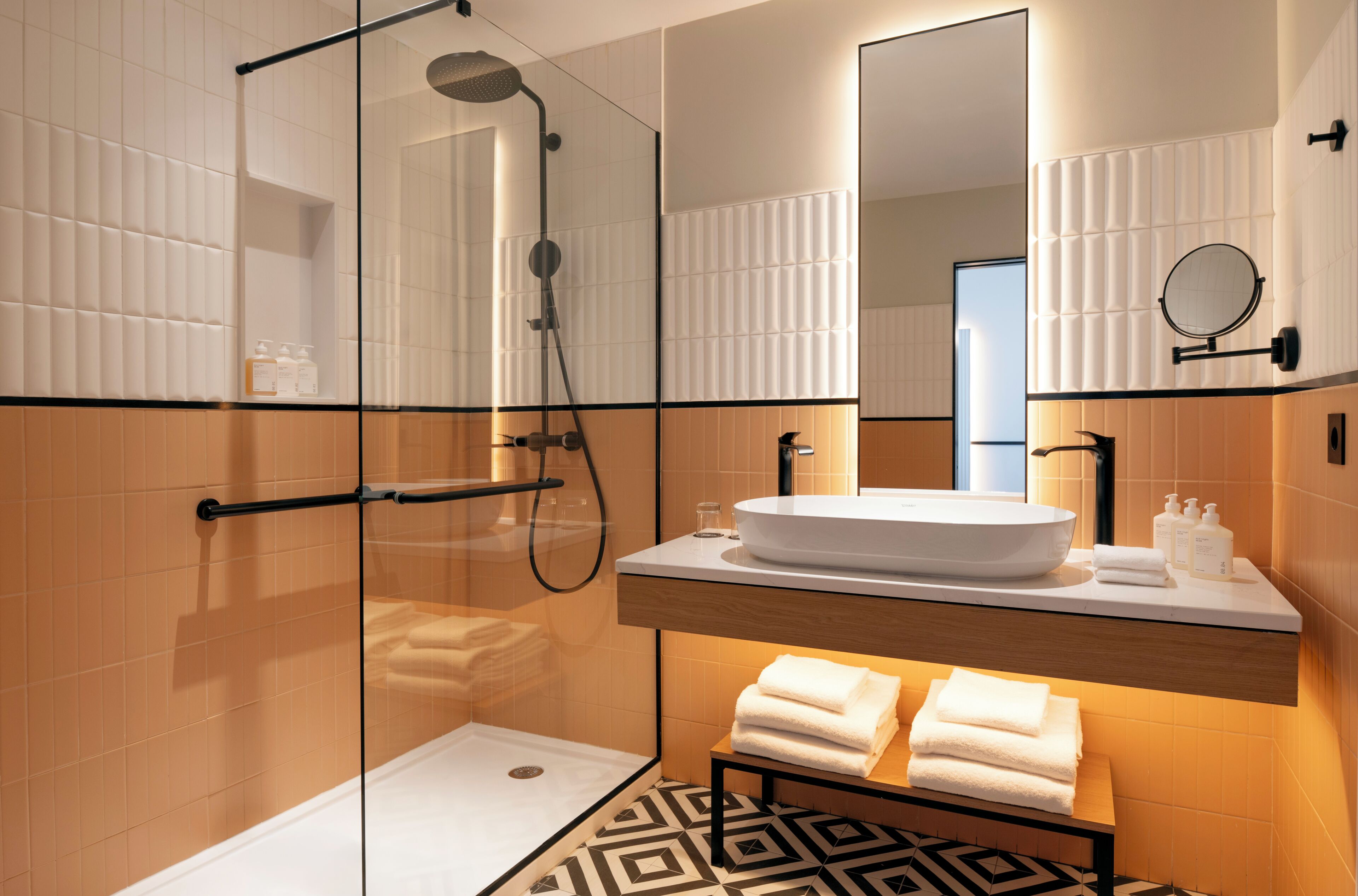Designer toiletries, hair dryer, bathrobes, slippers