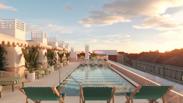 En säsongsöppen utomhuspool, parasoller och solstolar