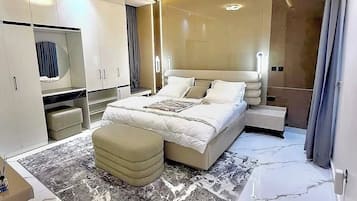 Deluxe Apartment, Balcony, City View | In-room safe, desk, laptop workspace, blackout curtains