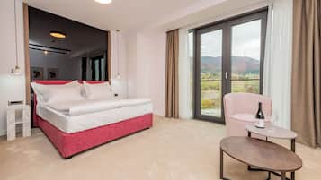 Superior Double Room, City View | Living area | 42-inch Smart TV with digital channels