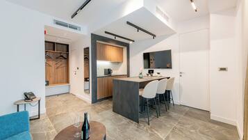 Deluxe Apartment | Living area | 42-inch Smart TV with digital channels