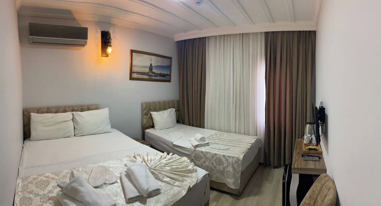 Economy Triple Room | In-room safe, desk, soundproofing, iron/ironing board