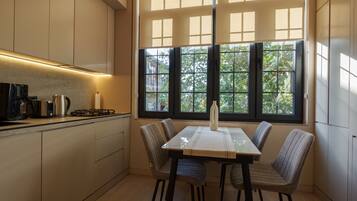 Design Apartment, Non Smoking | Private kitchen | Full-sized fridge, microwave, oven, stovetop