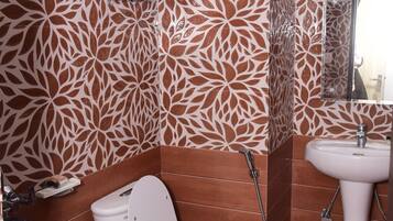 Deluxe Room | Bathroom | Slippers